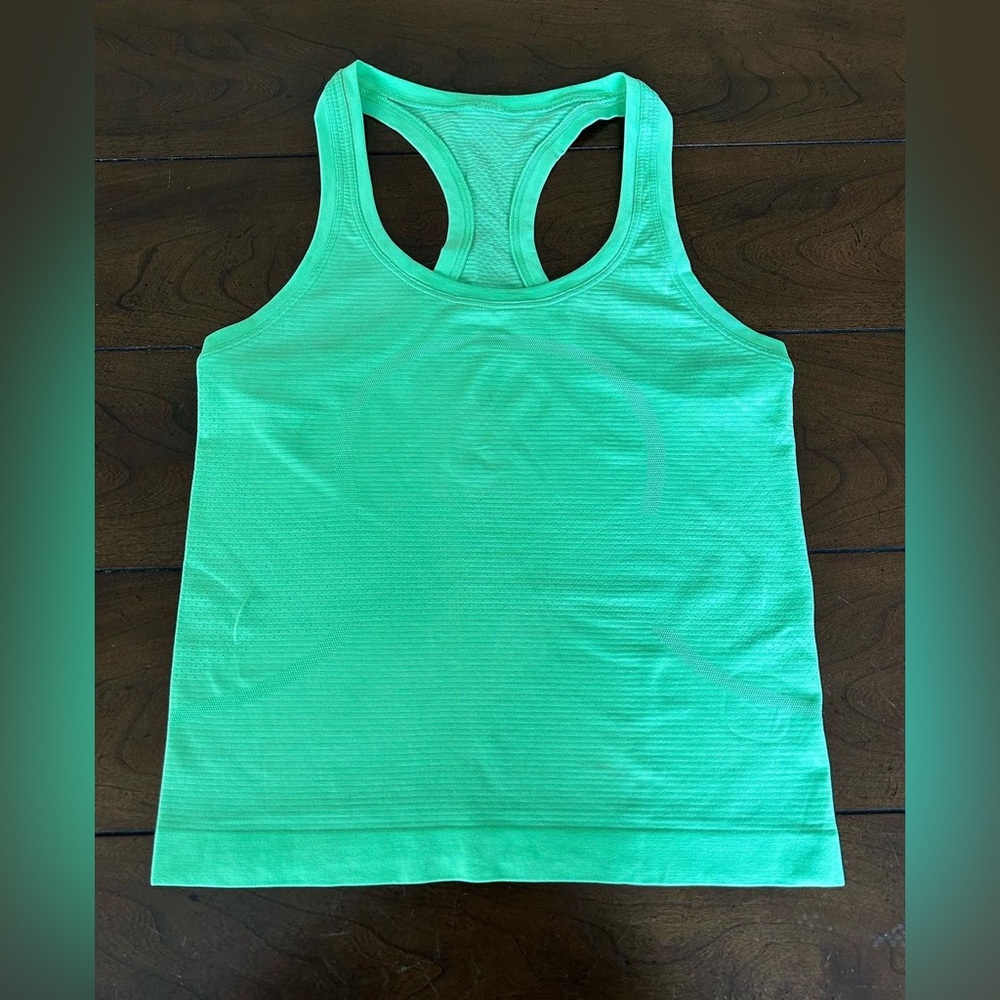 lululemon swiftly tec race length never worn the color is scream green size 4